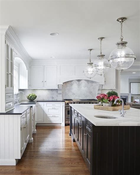 black stainless steel kitchen white cabinets square island|black island white kitchen ideas.